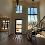 professional window cleaning in progress with equipment and staff ensuring spotless shine for commercial properties in edmond ok
