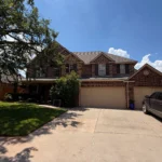professional window cleaning service in progress with equipment and staff ensuring clear views and shine in edmond ok
