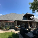 professional window cleaning service in progress with equipment and staff ensuring spotless shine for commercial properties in edmond ok